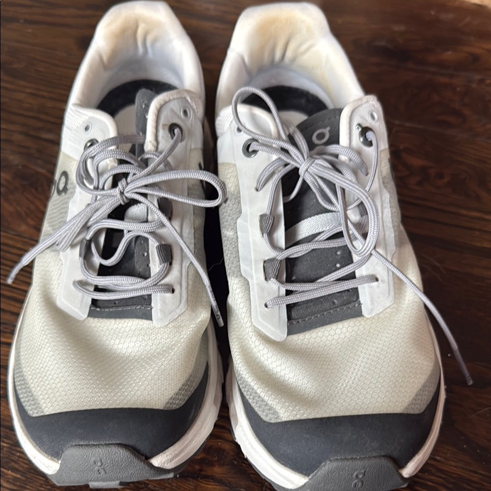 On Running White and Gray Sneakers